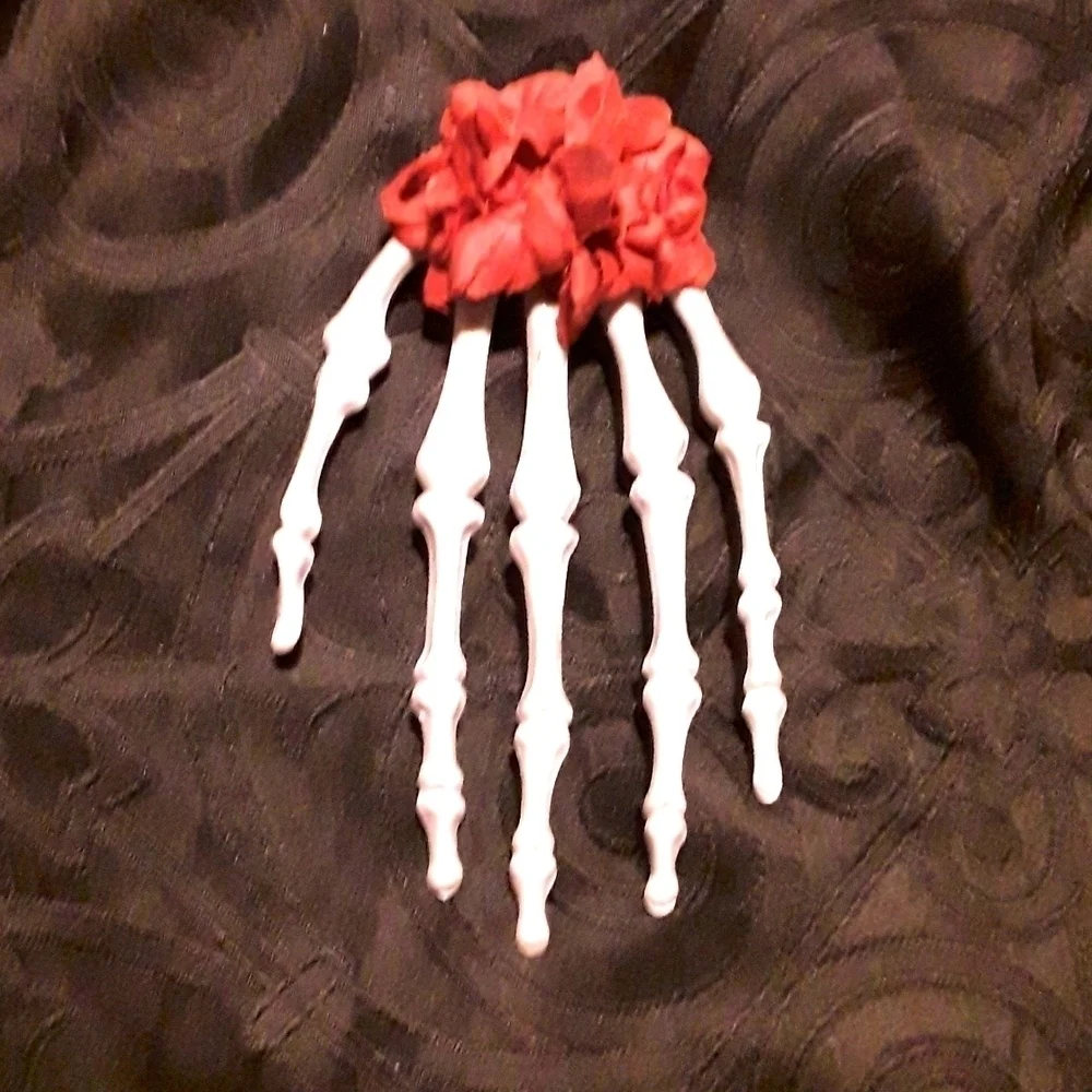 Skeleton hand rose hair clip